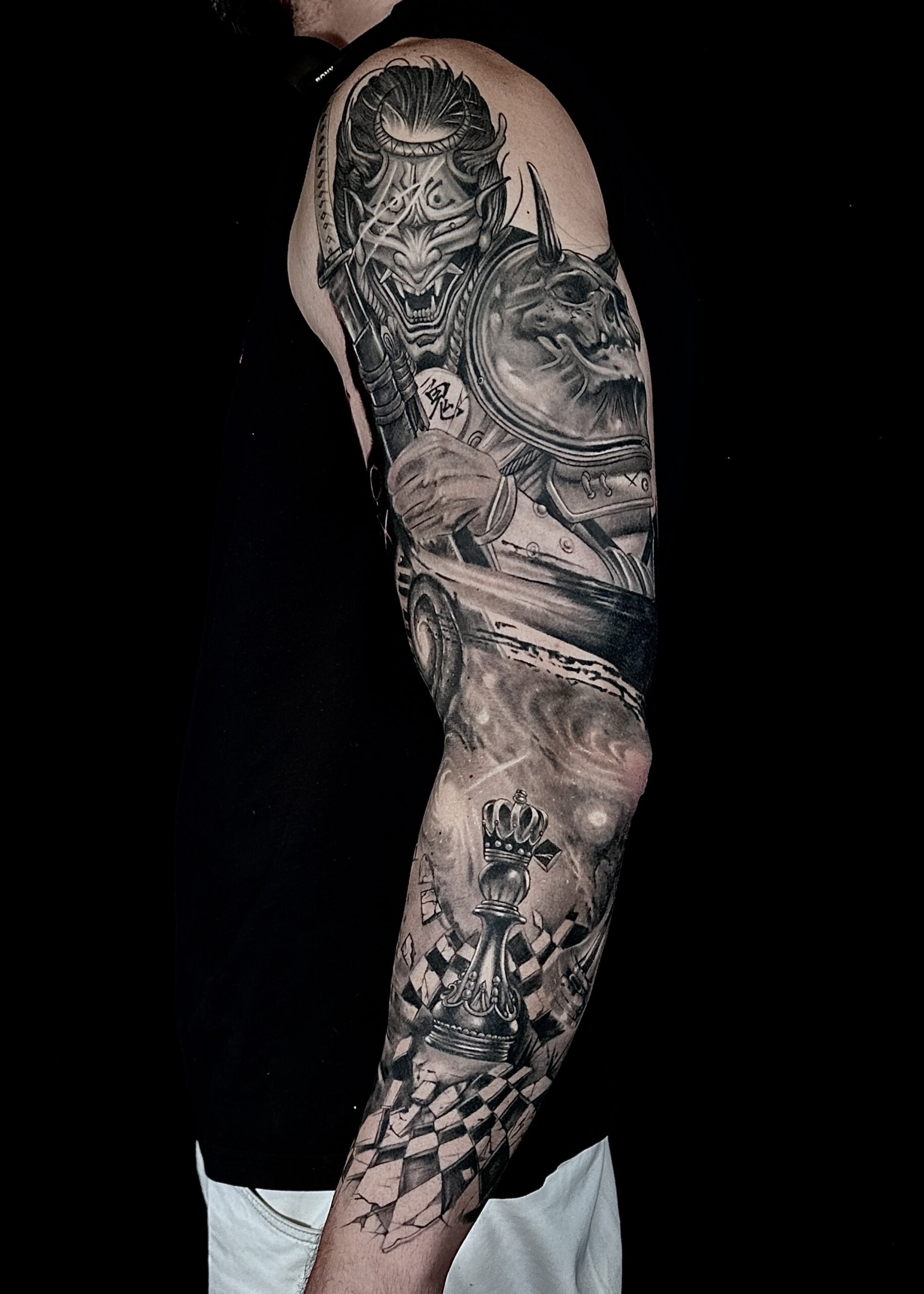 black and grey tattoo sleeve samurai chess mythology galaxy fusion tattoo by Assassin Tattoo Houston