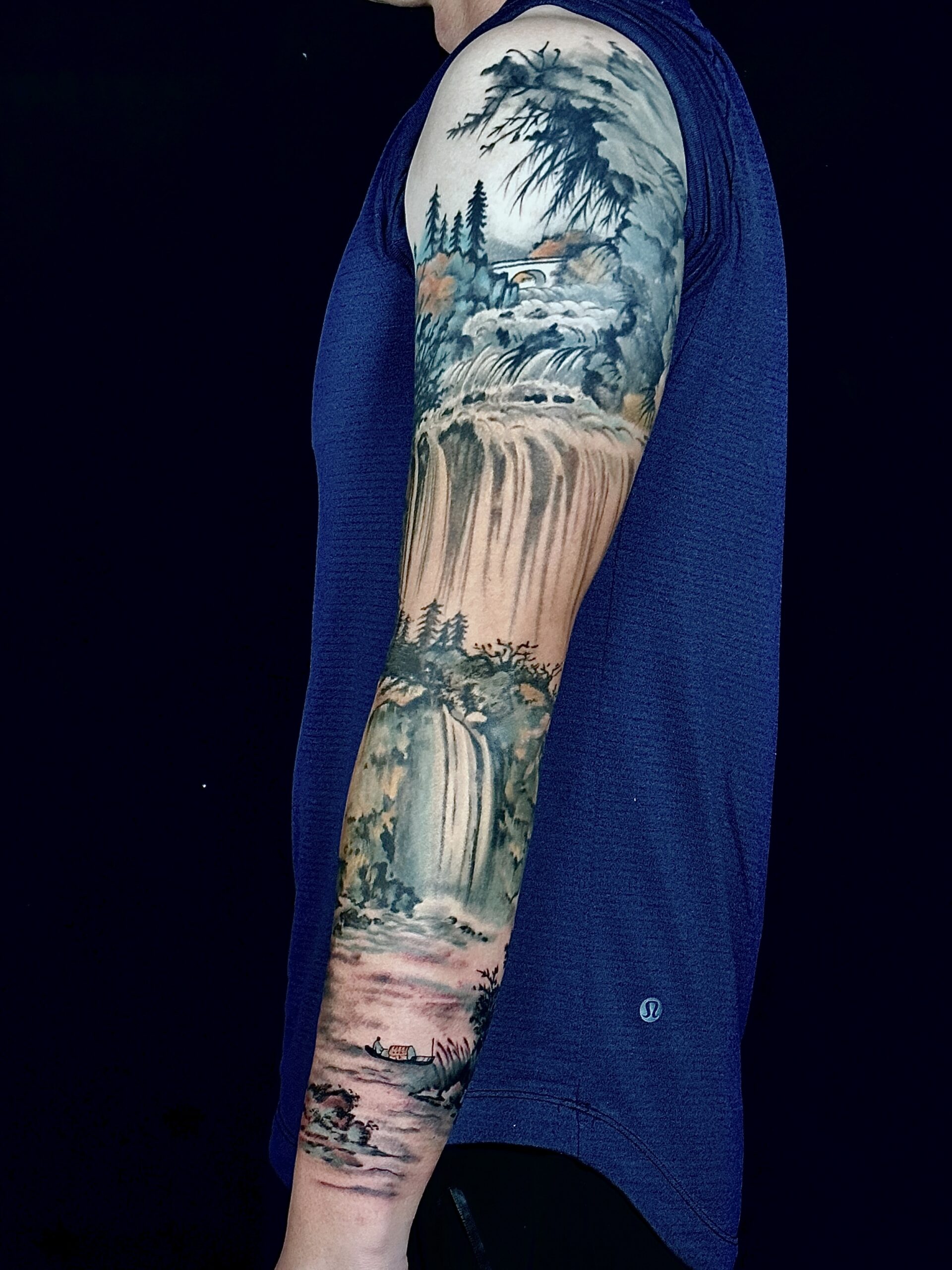 Chinese traditional ink wash tattoo sleeve landscape waterfall fisherman scene by Assassin Tattoo Houston